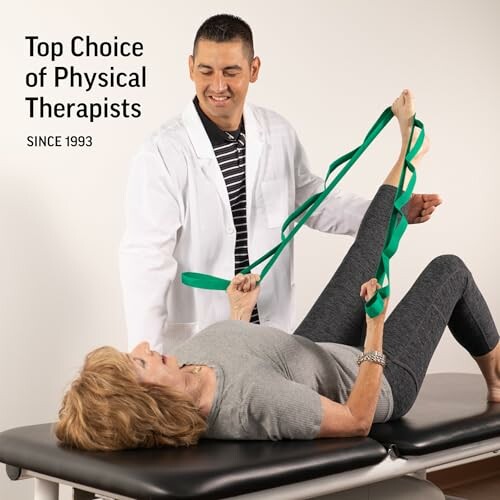 A therapist assists a woman with stretching on a table.