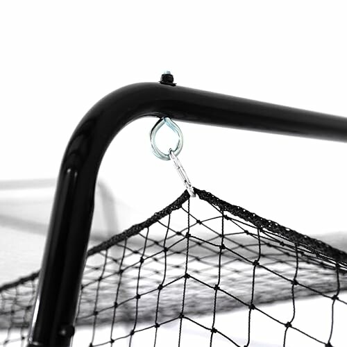 Close-up of a soccer goal corner with net attached.