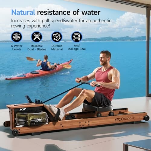 Man using a water rowing machine indoors with a scenic lake view.